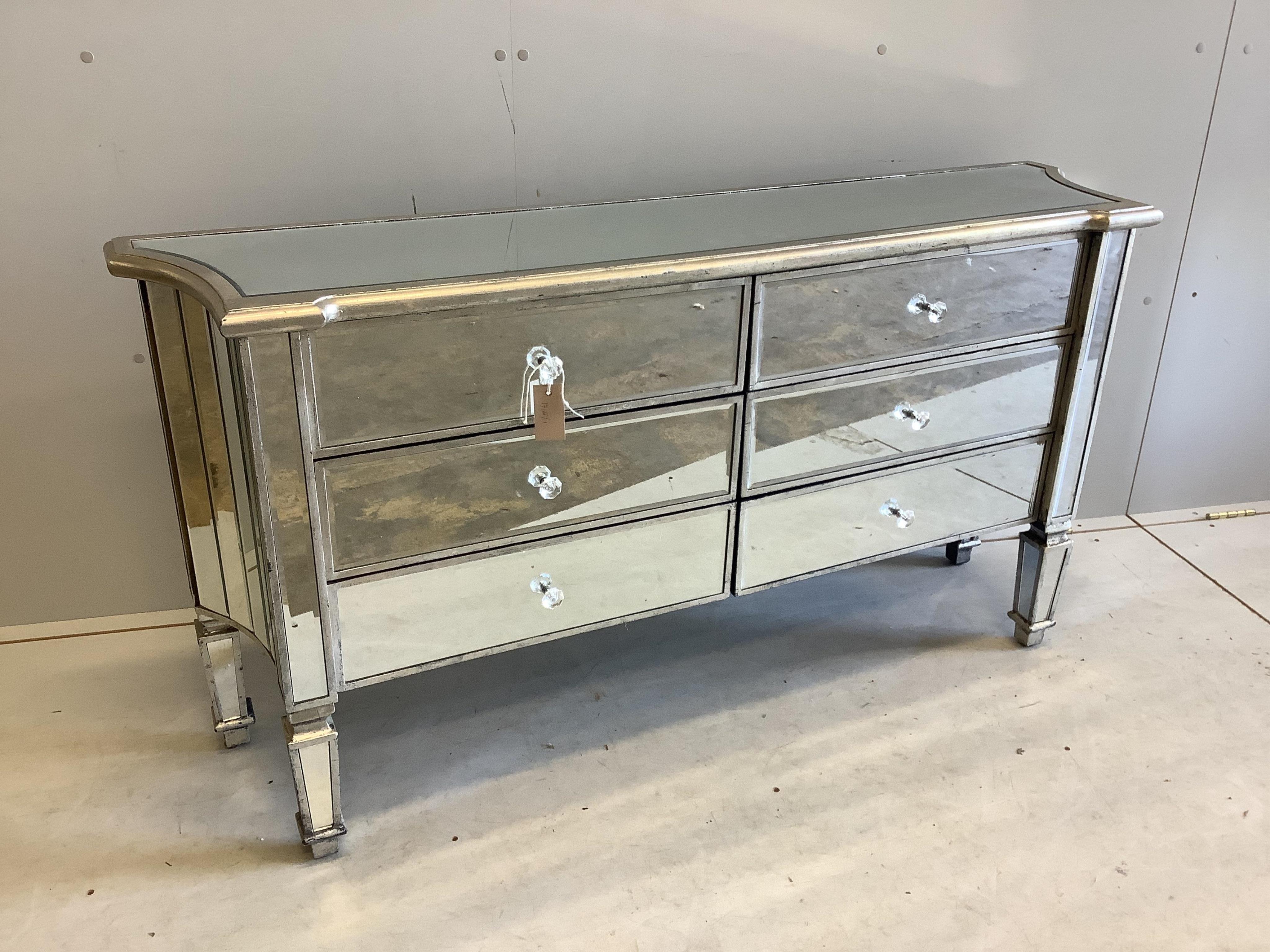 A Contemporary mirrored chest of drawers, width 138cm, depth 34cm, height 73cm. Condition - good